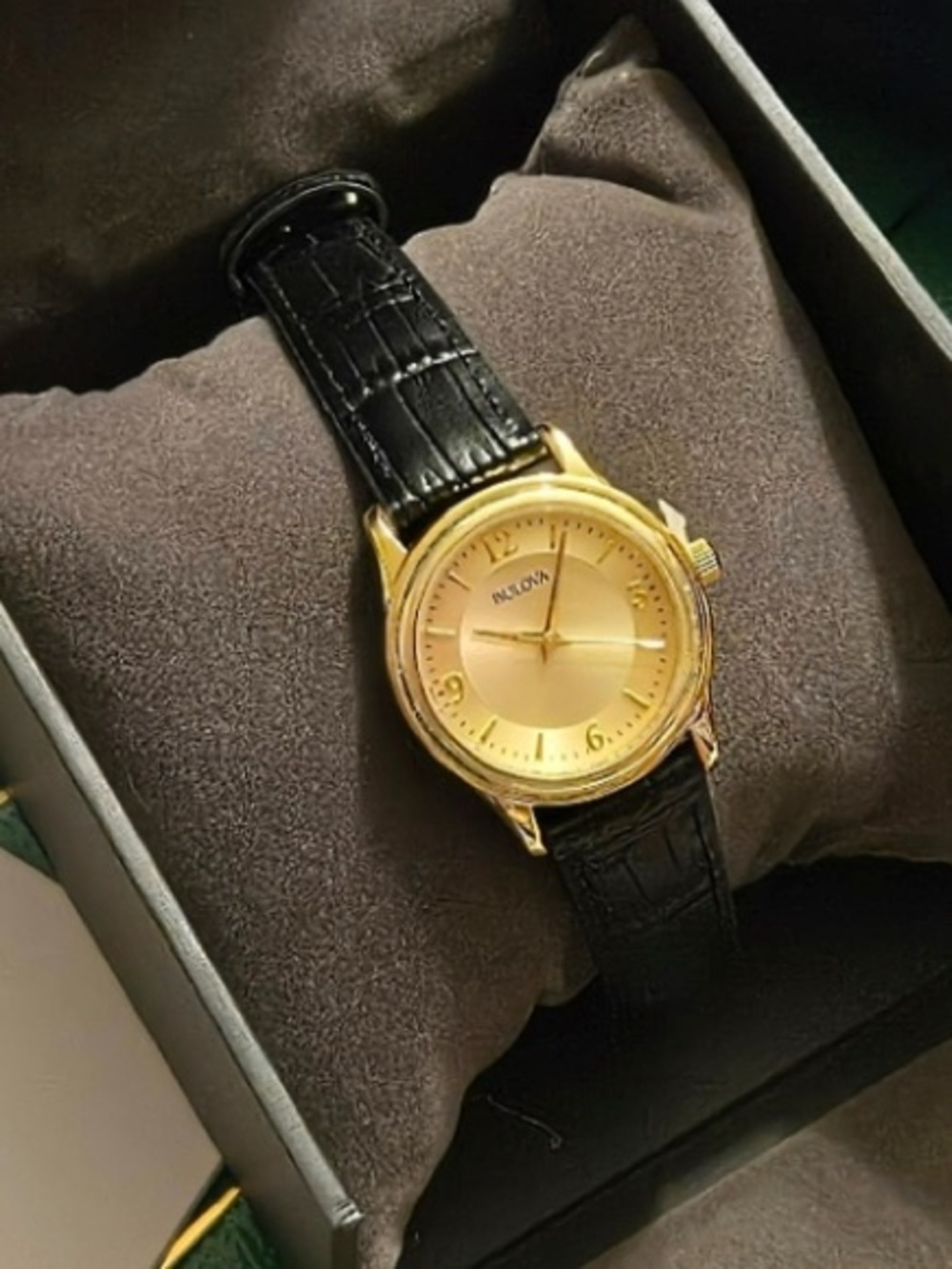 Bulova Gold Dial Watch with Black Leather Strap